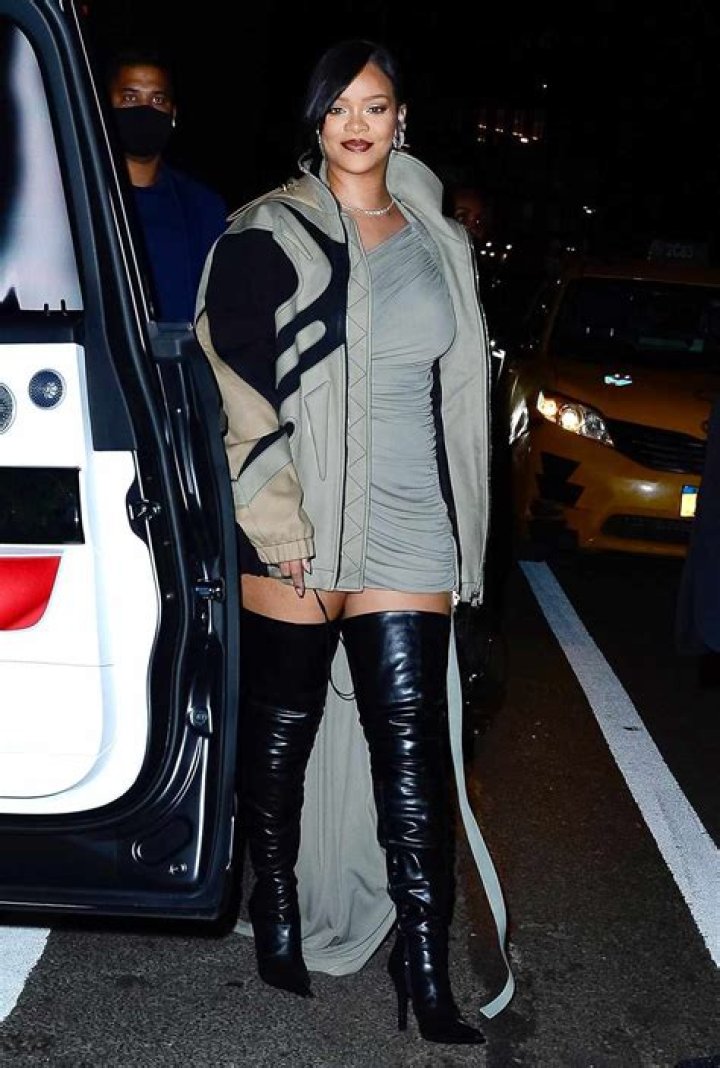
Rihanna Slays Thigh High Boots & Mini Skirt Out With A$AP Rocky In NYC 